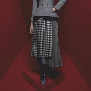 RARE! The Dior AW2022 asymmetrical flared wool long skirt.